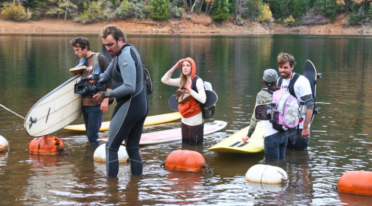 The Director getting ready to shoot the gang coming out of the water.