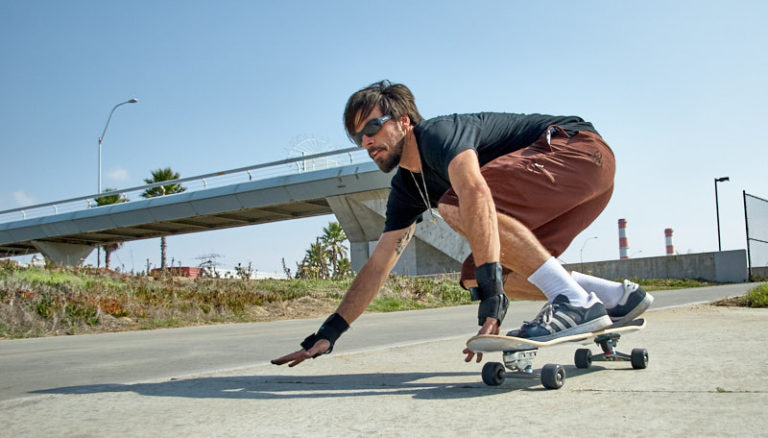Sean Gray testing out a Carver Skateboard.