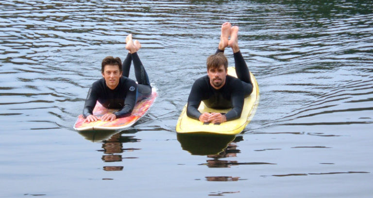 Chris Blasman and Sean Gray keeping their hands and feet out of the freezing water.